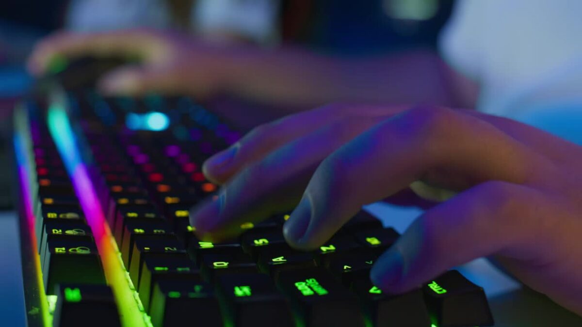 Mixkit Hands Of A Man Playing On A Computer 43527 Medium