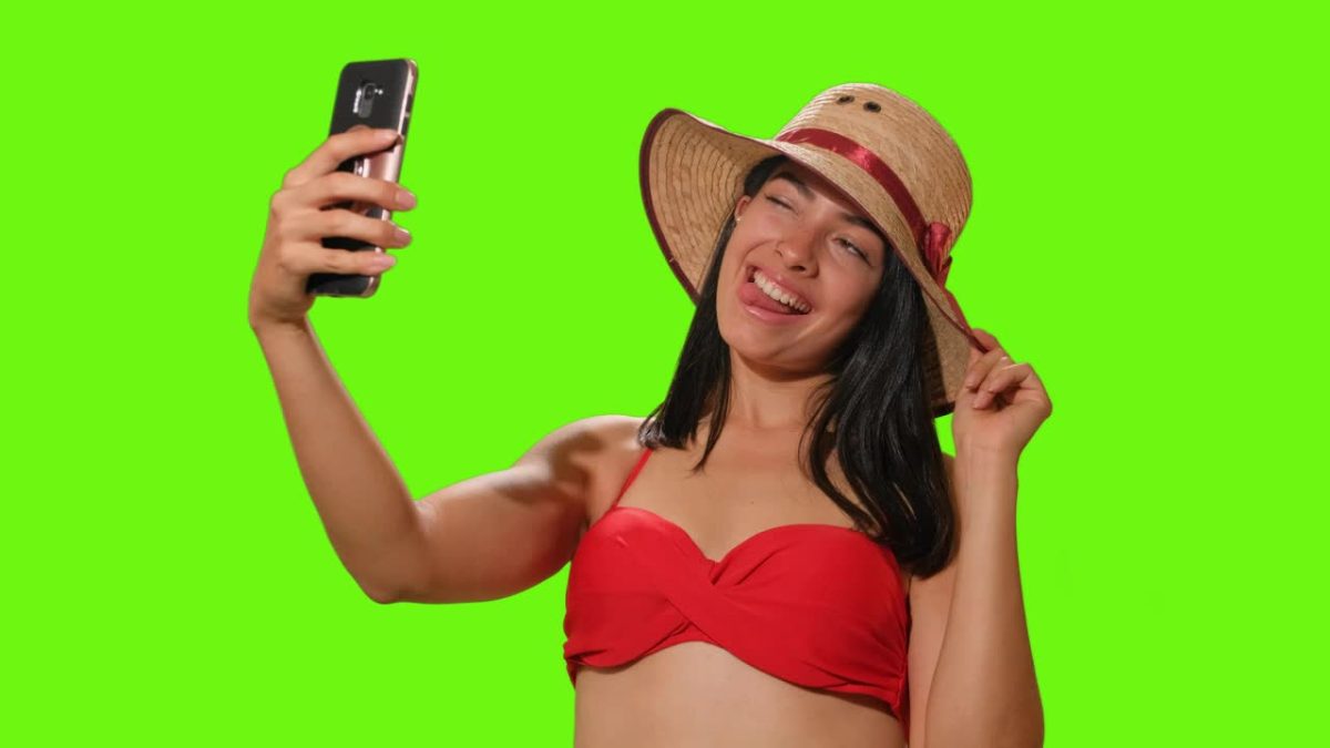 Girl In Beachwear Takes A Selfie On Green Screen 28291 Medium